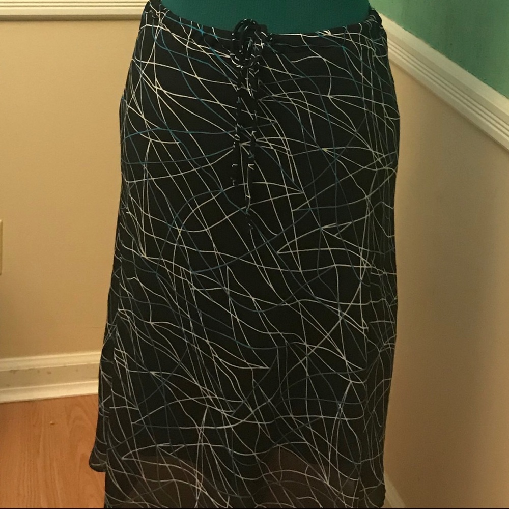 Calf length skirt with drawstring/ elastic waist.